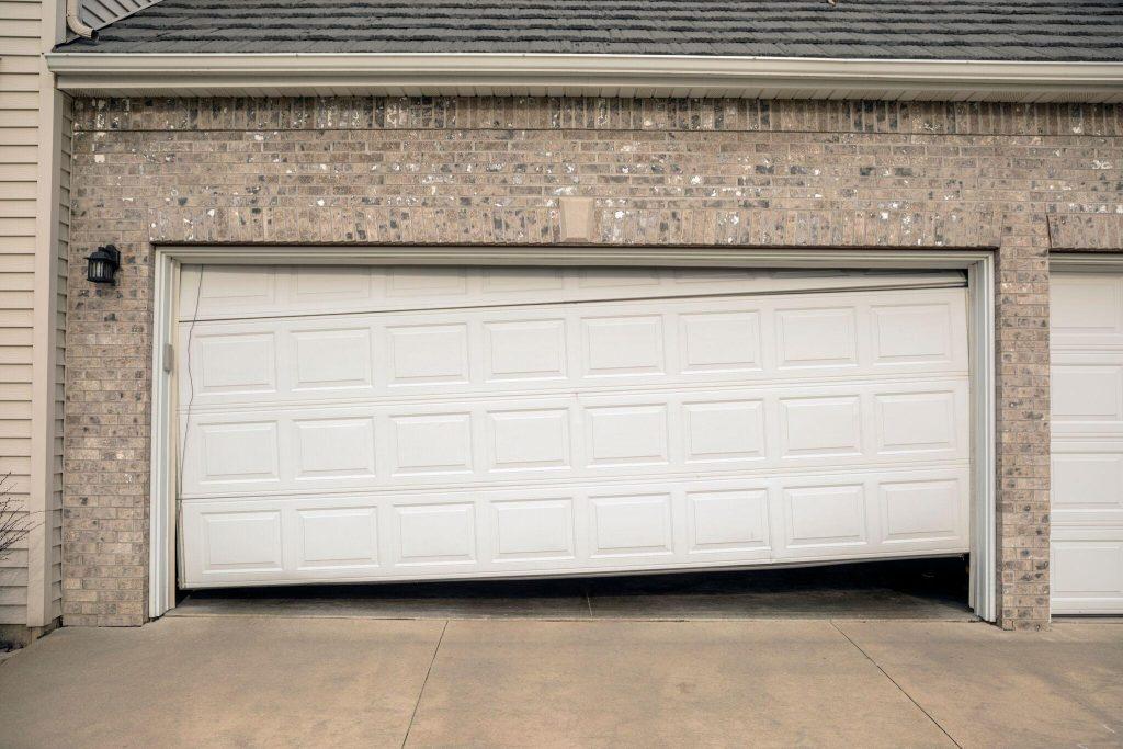 Garage Door Makes Clicking Noise Won'T Open