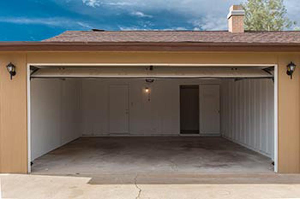 What Causes A Garage Door To Open On Its Own