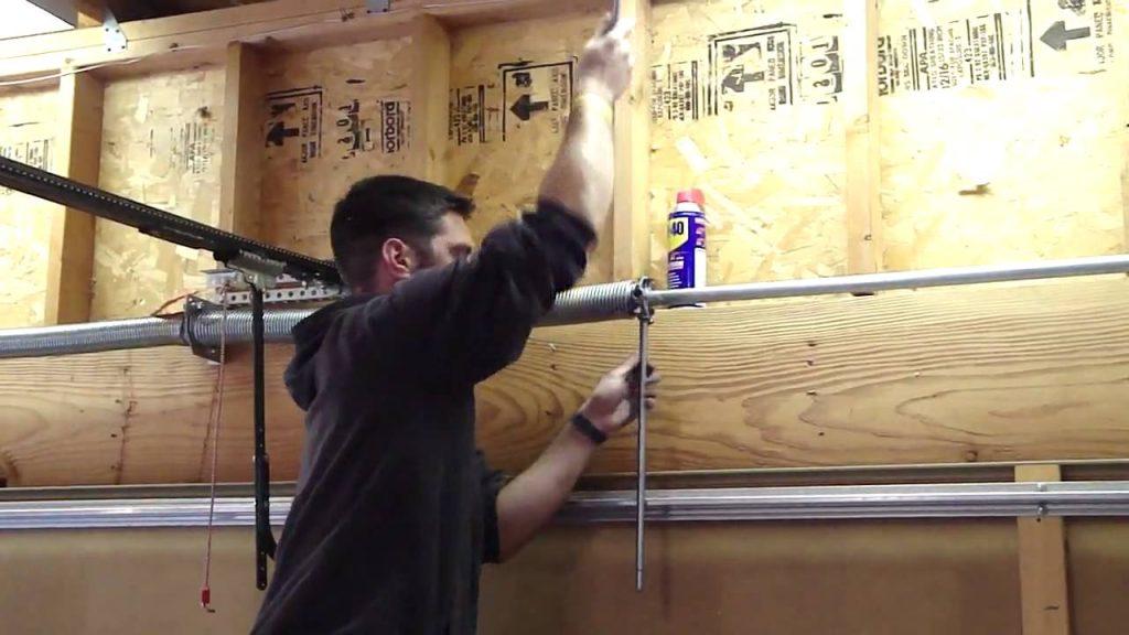 How To Adjust Spring Tension On Garage Door
