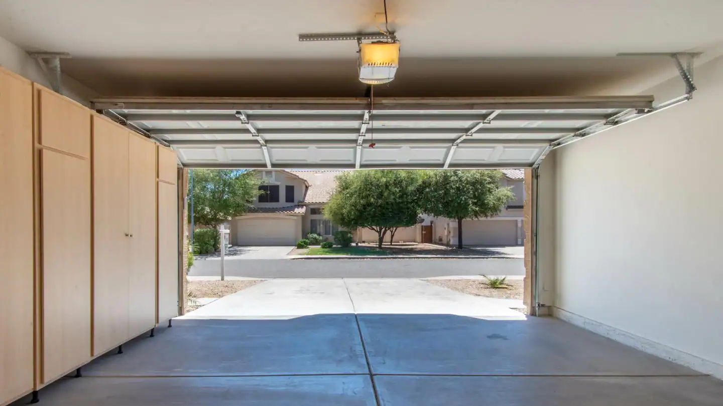 Why Does My Garage Door Open and Close By Itself? Demystifying the Enigma