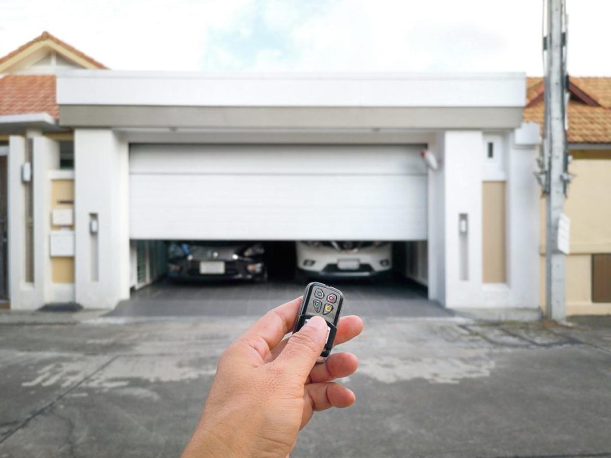 Why Does Your Garage Door Close and Open Again?