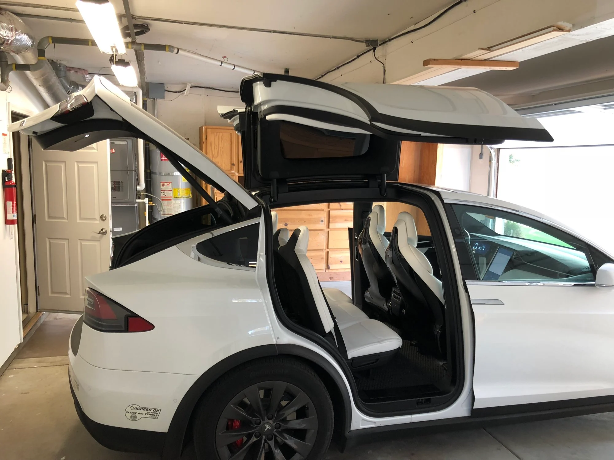 Enhance Your Tesla Model X with a Cutting-Edge Garage Door Openers System