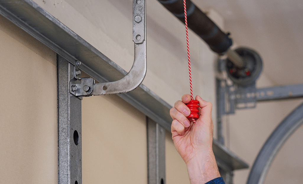 Garage Door Will Not Open Unless I Hold The Button? Here’s How to Fix It