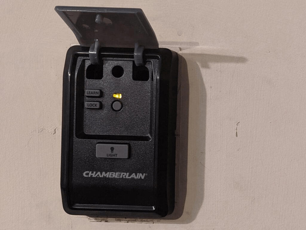 What Does The Lock Button Mean On Garage Door Opener? Understanding Its Purpose and How to Use It Safely