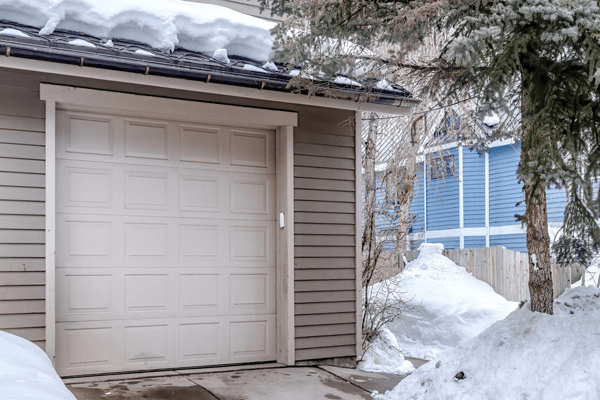 Why Your Garage Door Opens a Little Then Stops in Cold Weather — Causes & Expert Fixes