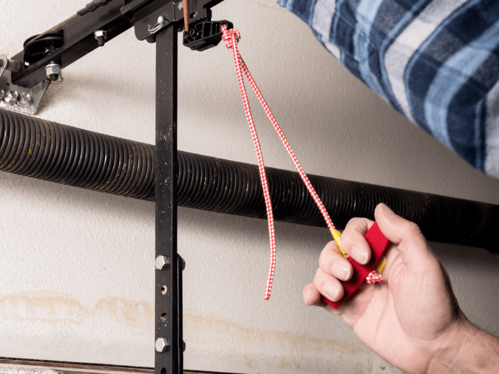 Have To Hold Down Garage Door Button To Open – Causes & Fixes